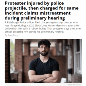 Protester injured by police projectile, then charged for same incident claims mistreatment during preliminary hearing